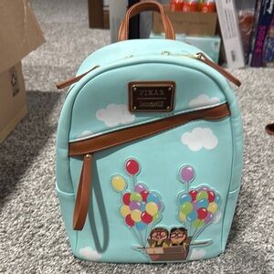 Loungefly Green and Brown Mini Backpack with Rounded Shape and Whimsical Design